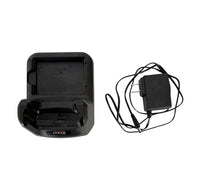 Black electronic device with charging cable on a white background